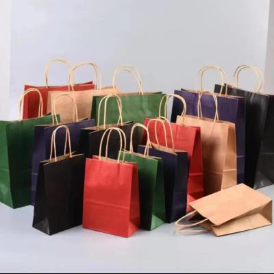 China Recyclable Brown Kraft Paper Shopping Bag Packaging With Handles CMYK Color for sale