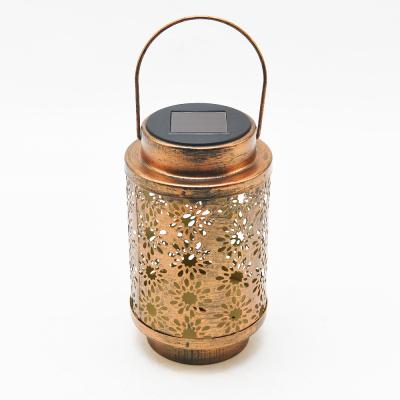 China Home Decoration Wholesale Hot Sale Patterned Metal Night Atmosphere Lanterns Cylinder Bronze Solar Led Hanging Lantern for sale