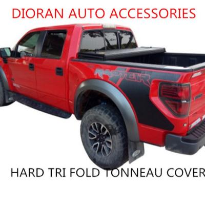 China Hot Selling 2022 Truck Tonneau Hard Triple Hard Cover For Hilux Revo 2015+ Pickup Accessories for sale