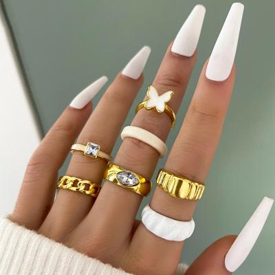 China Sindlan 7pcs/set CLASSIC White Acrylic Drip Butterfly Rings White Gold Plated Ring Set For Women for sale