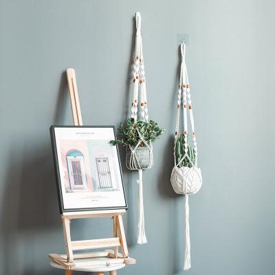 Китай Minimalist Handwoven Luxury Bohemian Decor Bohemian Cotton Indoor Garden Flower Pot Basket Macrame Plant Fresh Net Hanging Hangers продается