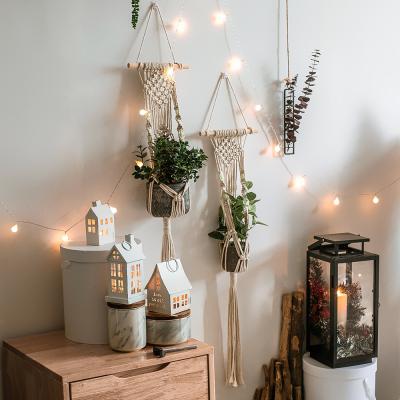 China Hot Selling Factory Price Boho Home Cotton Rope Handmade Decor Wall Hanging Macrame Plant Basket Macrame Hanger à venda