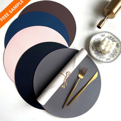 中国 Sustainable Hot Selling Luxury Round Leather PU Leather Round Two Tone Dinner Place Mat Table Mat Set 販売のため