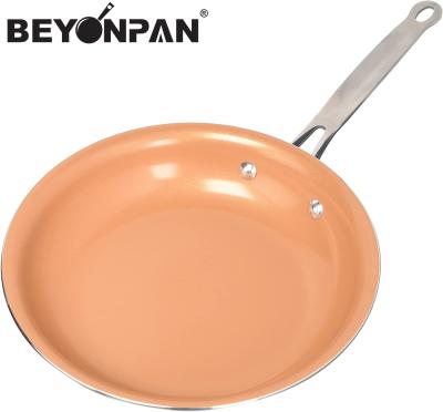 China Transitional Pressed Aluminum Copper Pan With Ceramic Coating Induction Bottom for sale