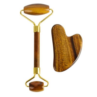 China Anti-Puffiness Wholesale Hot Sale Facial Massage Jade Tiger Eye Face Roller Gua sha With Box for sale