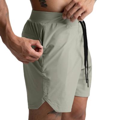 China Single Layer Woven Quick Dry Men's Gym Anti-Wrinkle Solid Color Men's Shorts Plus Size Five Men's Shorts Casual Sports Pants American Shorts for sale