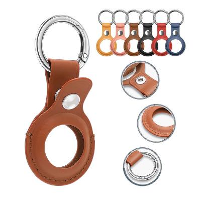 China Anti-lost Buckle Holder Luggage Shell Tracker Airtags Cover Keychain Cavity PU Leather Keychains Case For Apple Airtag for sale