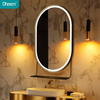 China DHEEM Luxury Oval Frame Bathroom Decoration Illuminated Wall LED Sensor Switch Makeup Mirror for sale