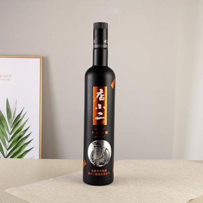 China Black Round Spirit Whiskey&Vodka Spirit Bottle Glass Liquor Bottle With Custom Logo for sale