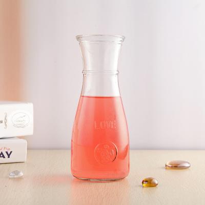 China Reusable Lemonade Bottles Bulk Water Storage Juice Glass Bottle Cold Pressed Orange Juice Bottles in Home and Kitchen for sale