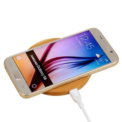 China Best Selling Portable Qi Wireless Fast Charger Mobile Phone Charging Station Wooden Bamboo Wireless Charger Station For iPhone for sale