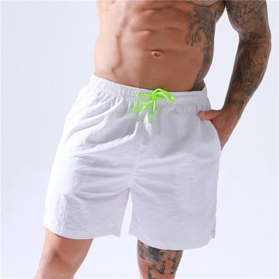 China OEM Logo Printed Mens Swim Trunks Beach Shorts High Quality Running Custom Quick Dry Breathable Men Swimming Shorts for sale