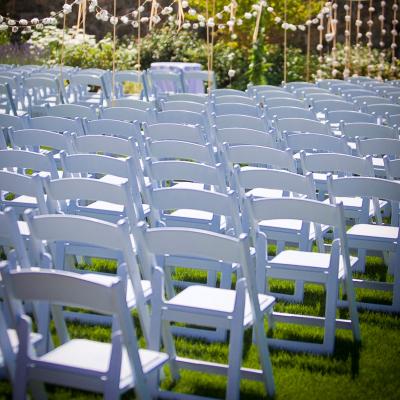 China Plastic foldable wholesale wedding resin white folding chair for sale