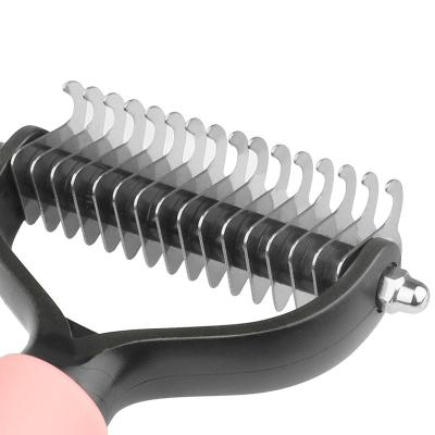 China Small Animals One Wrench Remove Hair Comb Pet Massage Throwing Remover Grooming Pet Hair Brush Removes Loose Tangles Fur for sale