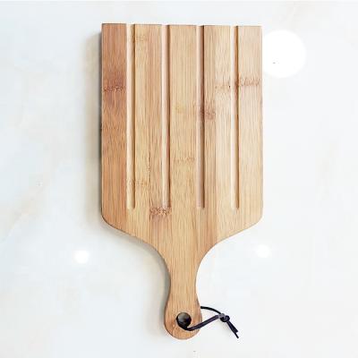 China Sustainable Wooden Cutting Plate Customized Natural Bamboo Kitchen Cheese Cutting Board for sale