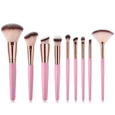 China Angular Blush Wooden Pink Handle 9pcs Soft Nylon Stiffens Kabuki Makeup Brush Cosmetic Brushes Eyeshadow Makeup Brush Set for sale