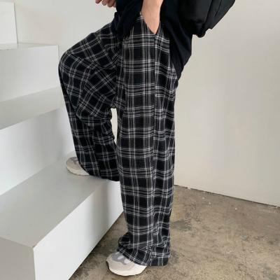 China Anti-wrinkle women's pants and trousers printed plaid pleated pants casual women piled pants for sale