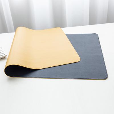 China Extended Protective Leather Waterproof Extra Large Water Resistance PU Office Gaming Mouse Pad for sale