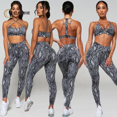 China CAMIE Women's Gym Wear Set Antibacterial Custom Snake Print Yoga Set One Shoulder Bra Butt High Waist Leggings Set Crack! crack! for sale