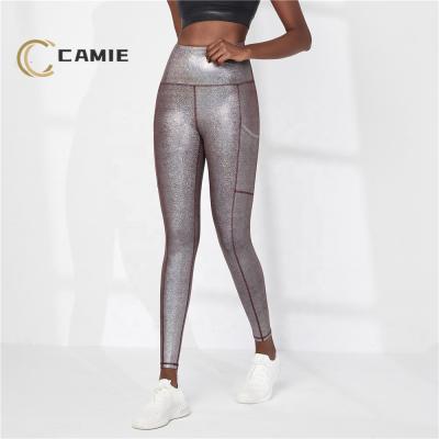 China Wholesale QUICK DRY CAMIE Workout Clothes Body Shaping Sets Women Hot Printed Foils Shiny Yoga Leggings Butt Lift for sale