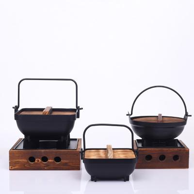 China Sustainable Sukiyaki Iron Pot With Lid Wooden Hot Pot Stove Japanese Hanging Restaurant Cooking Set for sale