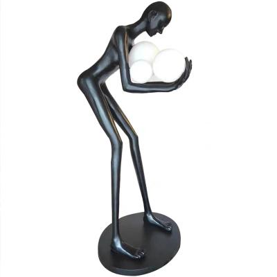 China Creative humanoid sculpture humanoid body floor lamp floor lamp hotel designer post-modern lobby large living room floor lamp for sale