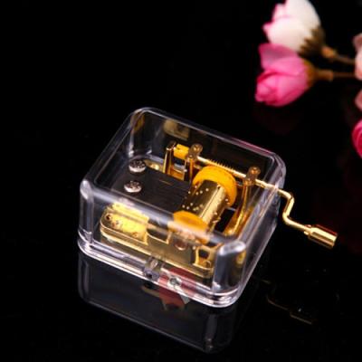 China Fashionable Christmas Gift Cheap Price Hand Crank Plastic Music Box for sale