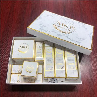 China 2021 Latest New Design Luxury Handmade Gift Box Gold Recyclable Balance Thick Cardboard Customized Boxes For Shipping Skin Care Products for sale