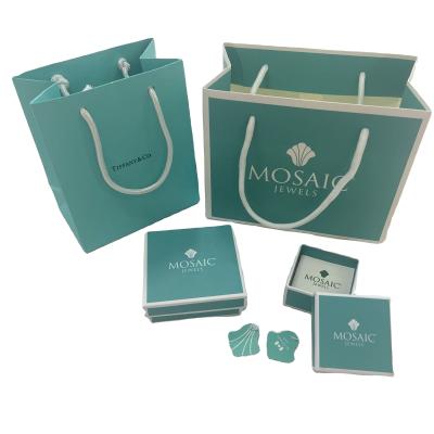 China Recyled turquoise logo fancy design jewelry tag and custom gift box and paper bag for shopping for sale