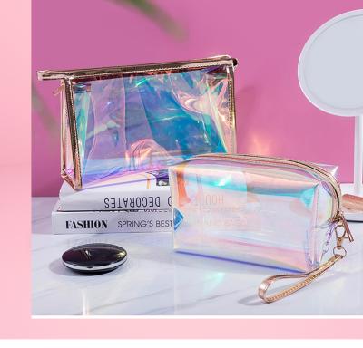 China Transparent PVC Fashion Bathroom Travel Waterproof Makeup Bag Rainbow Cosmetic Pouch For Lady for sale