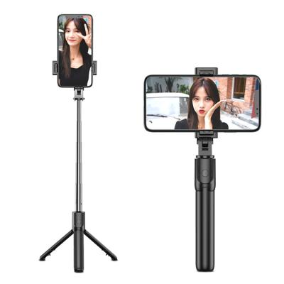 China 2022 Hot Selling Wireless Remote Selfie Stick Tripod Selfie Stick S02 Fold Along for sale