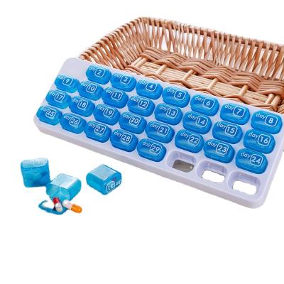 China Eco Friendly Separable Pill Organizer Travel Keyboard 31 Compartment Medicine Storage Case Monthly Pill Case for sale