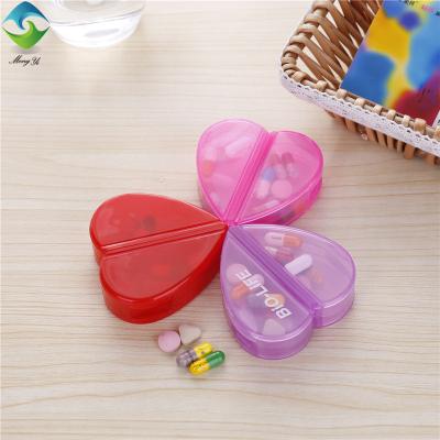 China Decorative Eco-friendly Heart Shaped Pill Box Pill Box Organizer With 4 Compartments Promotional Gift for sale