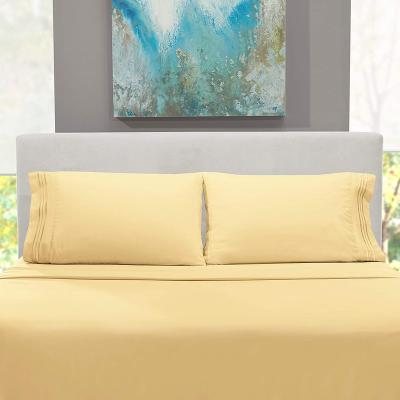 China Nondisposable Hotel Bed Sheet Sets With Embroidery 100% Polyester 4 Pieces Microfiber Color Bed Sheet Solid Yellow Bedding Set for sale