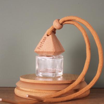 China Cosmetic 8ml Air Freshener Perfume Diffuser Empty Clear Frosted Square Car Hanging Perfume Bottle With Triangle Wooden Cap for sale