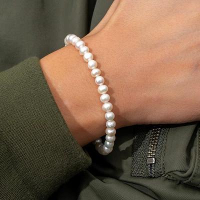 China Natural Freshwater Chain Clasp CLASSIC 6MM Round Pearl Bracelet Stainless Steel For Men And Women With 5cm Extender Chain for sale