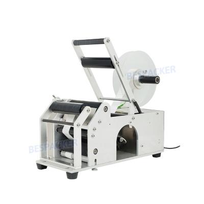 China Food Bespacker XT-50 High Efficiency Manual Pet Plastic Glass Bottle Round Bottle Self Adhesive Labeling Machine for sale