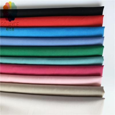 China Manufacturers Anti-Static Plain Weave Dyed 100% Cotton Poplin Shirt /Blouses Uniform Fabric for sale