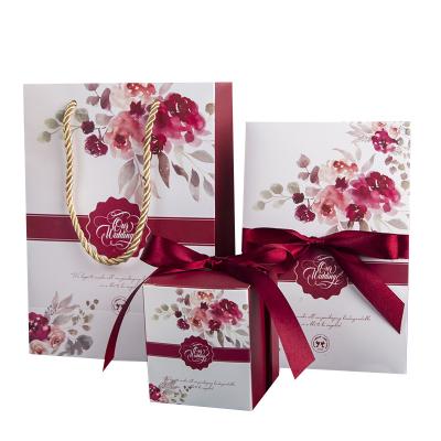 China Custom Creative Wedding Gift Envelope Kit Red Wine Invitation Candy Box Hand Paper Bags for sale