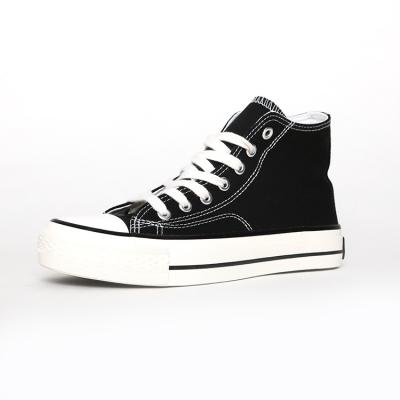 China New Fashion Trend Design Spring And Summer Ladies Flat Black And White Canvas Shoes for sale