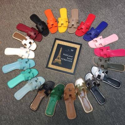 China Cheap Fashion Trend Manufacturer Supplier China Women Shoes Women Slippers Beach Flat Sandals for sale