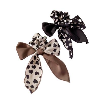 China Simple Fashion Leopard Bow Ribbon Hair Rope Ribbon Women Tied Hair Ring Hair Accessories for sale