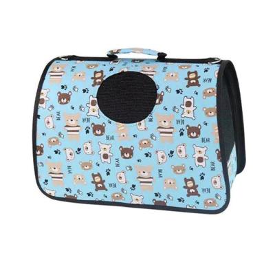 China Fashion Pet Foldable Travel Handbag Breathable Pet Carrier Travel Bag for Dog and Cat for sale