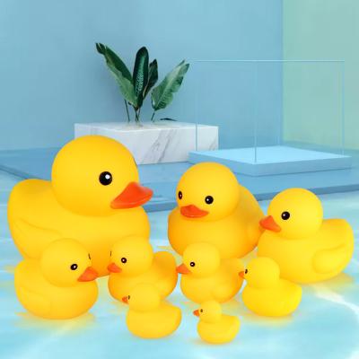 China Duck Kids Shower Swimming Small Mini Yellow Duck Bath Toy Bulk Rubber Pop Floating Ducks For Baby for sale