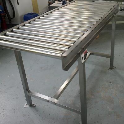 China Customized transmission curve gravity heat resistant roller conveyor for logistics sorting. for sale