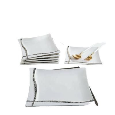 China Sustainable Electric Dinnerware 7pcs Plating Gold Silver Ceramic Dinner Plate Set for sale