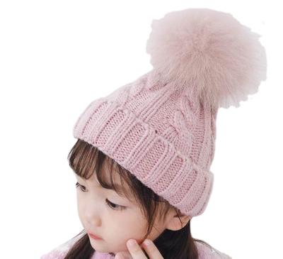 China COMMON Kids Winter Knitted Pom Pom Cap Hat Unisex Kids Beanie Faux Fur Ball Pom Beanie Bobble Hat Cotton Lined for sale