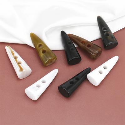 China Sustainable Vintage Buffalo Horn Color Button Plastic Resin Buttons For Clothes for sale