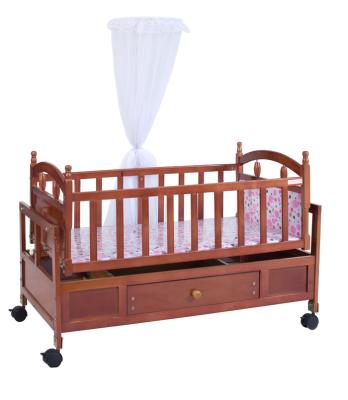 China 2021 New Contemporary Baby Crib Multifunctional Wooden Baby Hutch With Wheels And Mosquito Net for sale