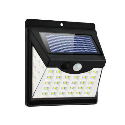 China Outdoor 4W Polycarbonate Wireless Solar Security Wall Light With Auto Adjusting Working Modes IP65 Waterproof Led Wall Lamps for sale